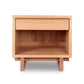 A Vermont Furniture Designs Kipling 1-Drawer Enclosed Shelf Wide Nightstand with a drawer on top.