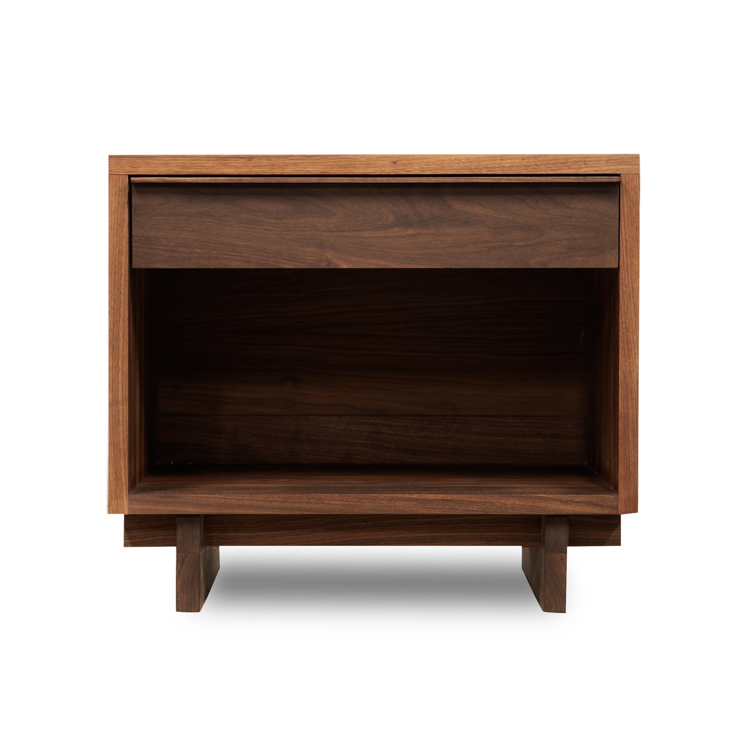 The Vermont Furniture Designs' Kipling 1-Drawer Enclosed Shelf Wide Nightstand in walnut features a minimalist design with a flat top and sturdy legs. This elegant nightstand includes a single drawer at the top and an enclosed shelf below, perfectly complementing your Kipling Platform Bed. Now available on clearance!