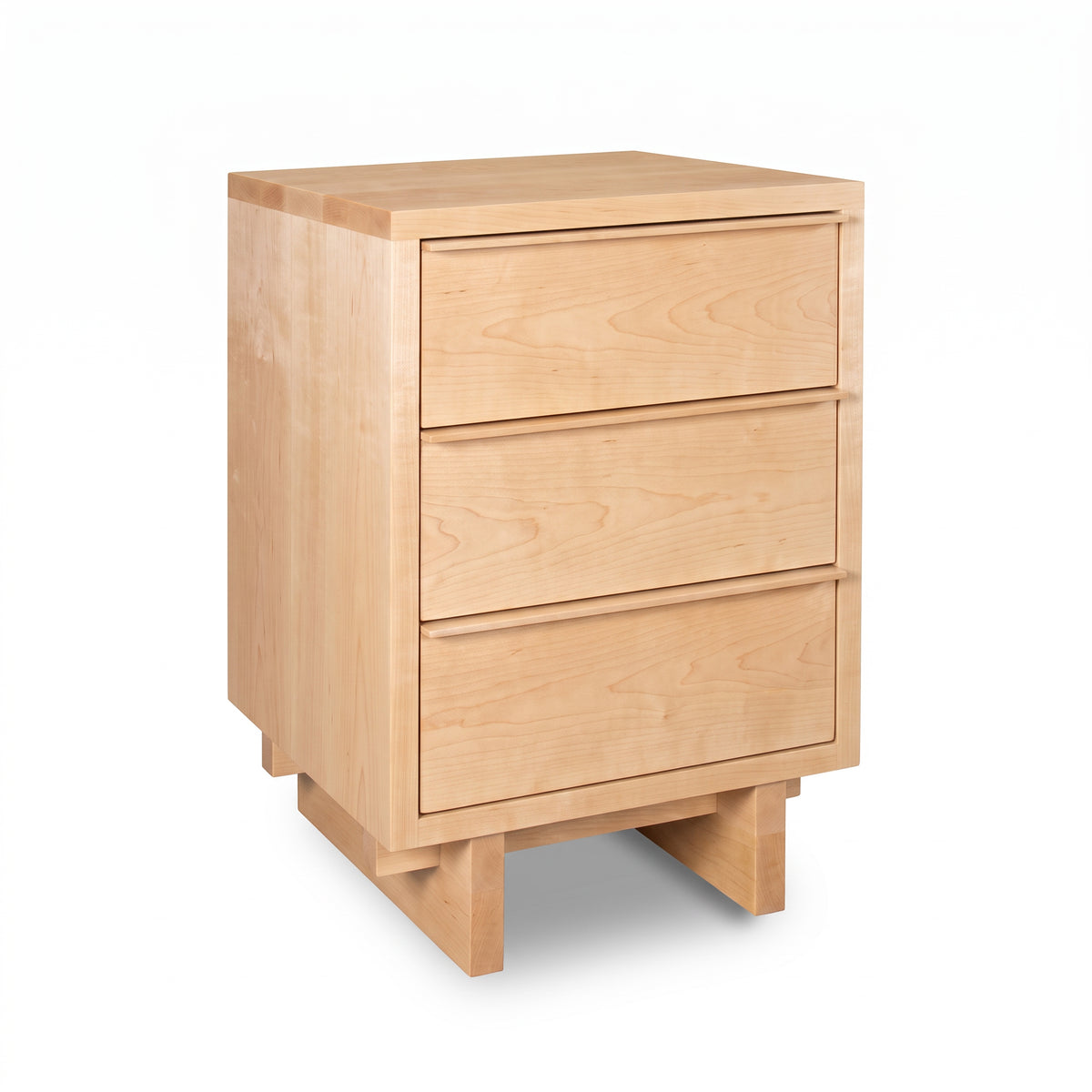 Vermont Furniture Designs Kipling 3-Drawer Nightstand in a light wood finish, showcasing minimalist, American-made craftsmanship and ample storage.
