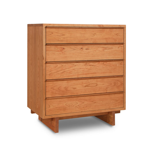A handcrafted Vermont Furniture Designs Kipling 5-Drawer Wide Chest isolated on a white background.