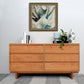 The Vermont Furniture Designs 6-Drawer Dresser combines modern design with ample bedside storage.