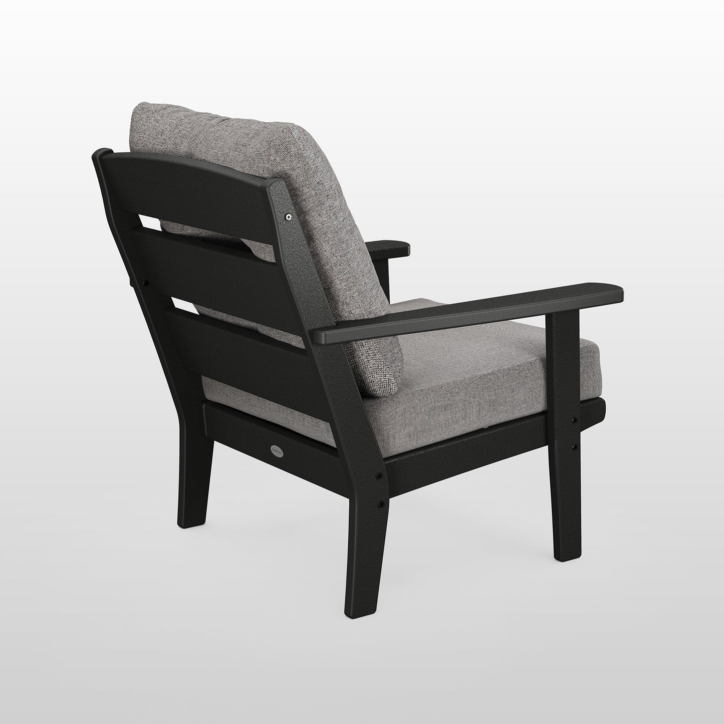 A modern black POLYWOOD® Lakeside Deep Seating Chair with gray cushions, featuring a geometric, angular design and sturdy armrests. The chair is shown against a plain white background.