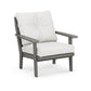 A modern all-weather outdoor chair with a gray metal frame and white cushions, isolated on a white background.(Product Name: POLYWOOD Lakeside Deep Seating Chair)