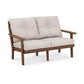 A modern two-seater POLYWOOD® Lakeside Deep Seating Loveseat with a wooden frame and neutral-toned cushions, featuring button-tufted backrest padding, isolated against a white background.
