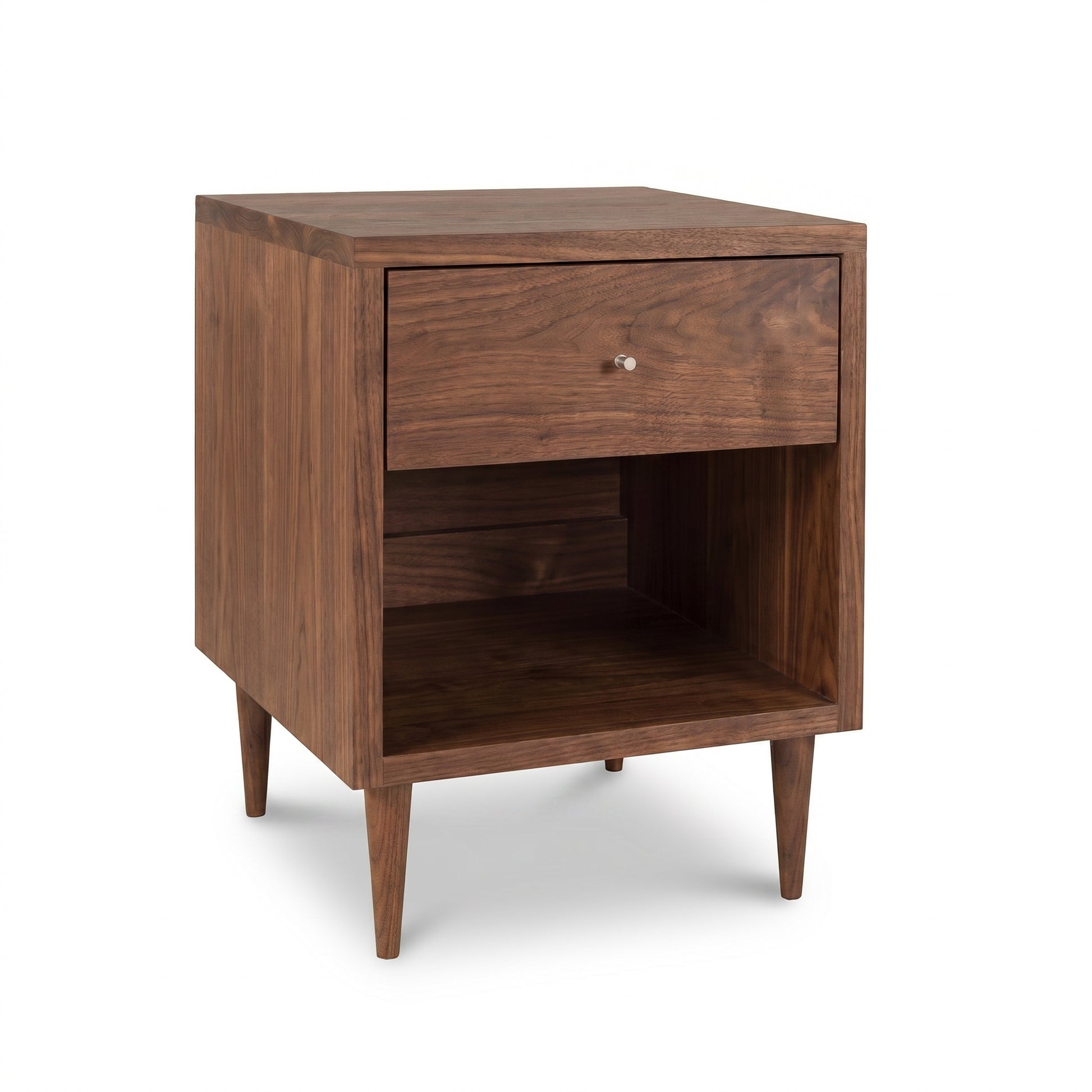 Vermont Furniture Designs Larssen nightstand in solid hardwood, with tapered legs, single drawer, and enclosed shelf. American made quality craftsmanship.