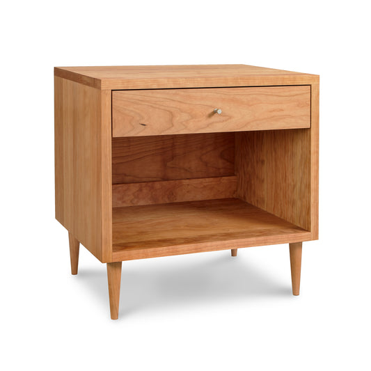 A Larssen 1-Drawer Wide Nightstand by Vermont Furniture Designs with a single drawer and an open shelf, set against a white background.