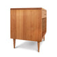 Introducing the Larssen 1-Drawer Wide Nightstand from Vermont Furniture Designs, this wide nightstand showcases a natural cherry finish, featuring two drawers and a convenient shelf.