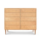 Larssen 10-Drawer Dresser by Vermont Furniture Designs showcases ample storage, a natural finish, and mid-century modern style.