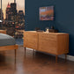 Larssen 6-Drawer Dresser by Vermont Furniture Designs showcasing its elegant craftsmanship and ample storage against a soft backdrop.