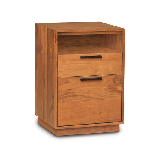 A wooden two-drawer Copeland Furniture Linear Narrow Rolling File Cabinet with Cubby isolated on a white background.