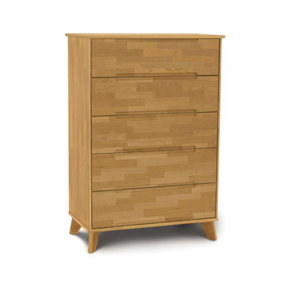 An upcycled Linn 5-Drawer Wide Chest made from sustainable hardwood on a white background from Copeland Furniture.