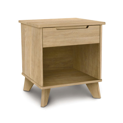 Linn nightstand by Copeland Furniture with a drawer, open shelf, and four angled legs made from sustainably crafted solid wood.