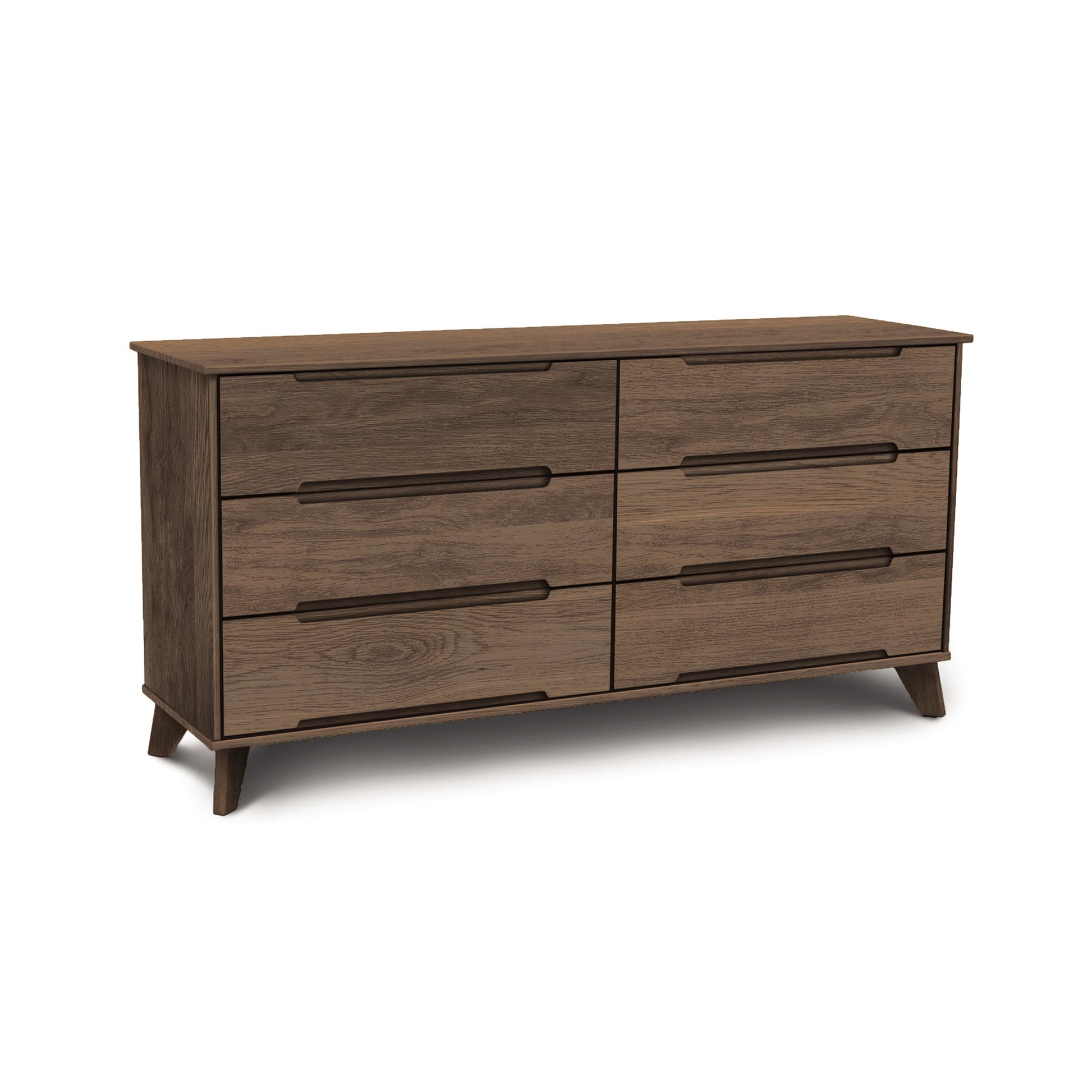 A Linn 6-Drawer Dresser from Copeland Furniture with a dark finish and angled legs, embodying the mid-century modern aesthetic.
