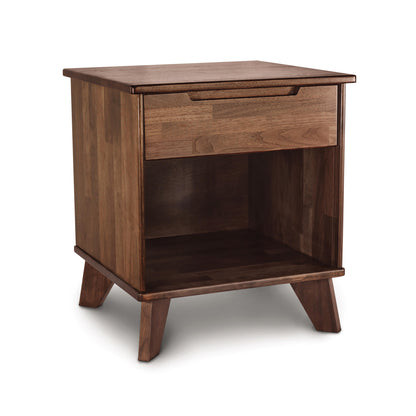Linn 1-Drawer Enclosed Shelf Nightstand by Copeland Furniture featuring angled legs, a sleek wooden finish, and both drawer and open shelf storage.