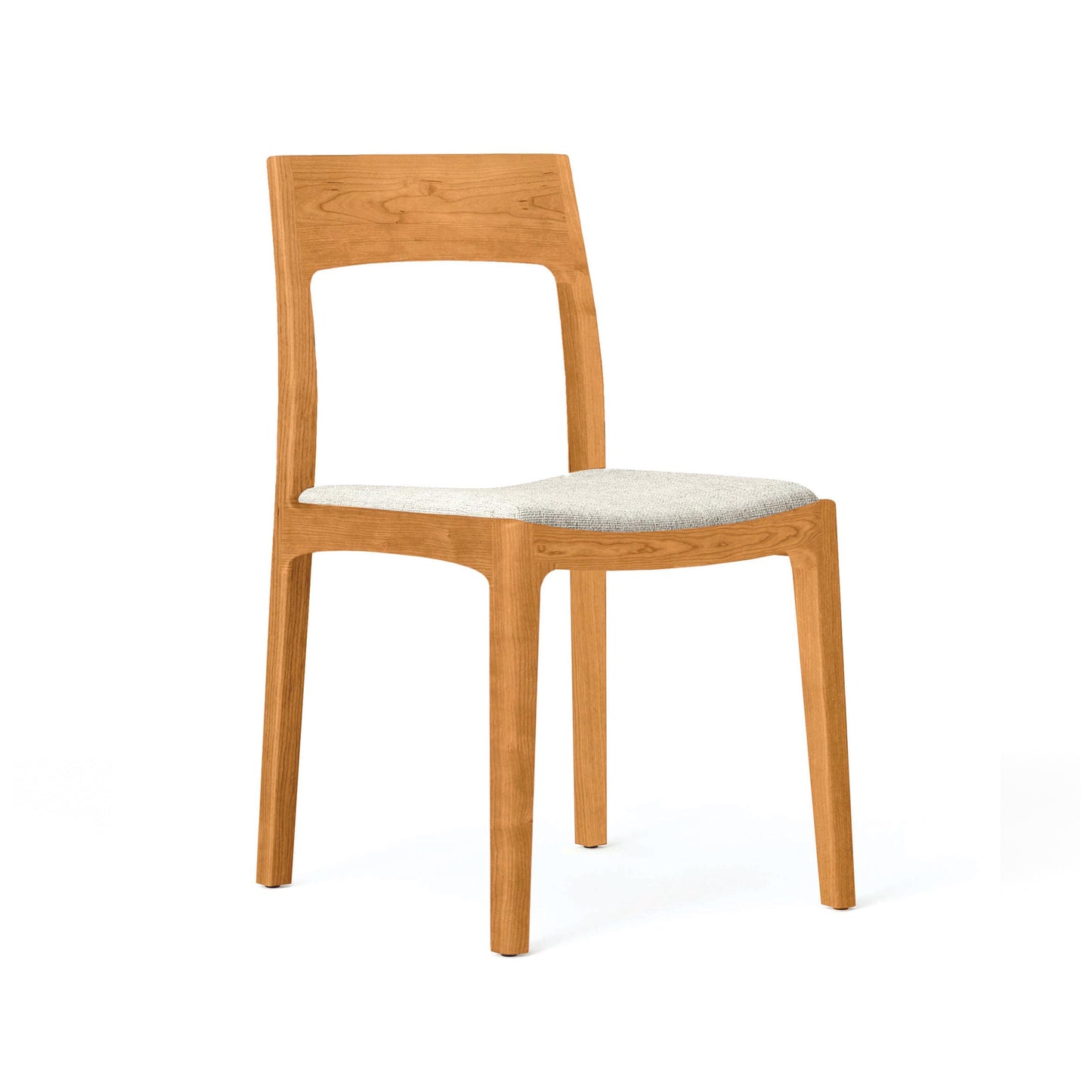 Lisse Upholstered Dining Chair by Copeland Furniture features a soft cushioned seat, curved backrest, and sleek modern design handcrafted in the USA.