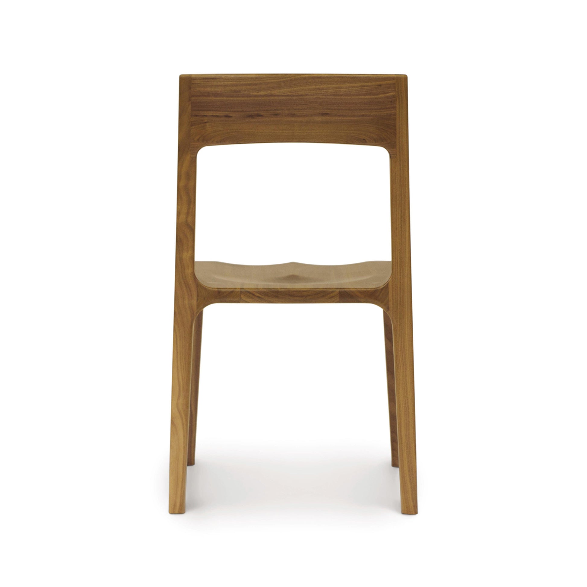 A Lisse Dining Chair from the Copeland Furniture Lisse Furniture Collection, featuring a walnut frame with a modern design, solid back and square legs, displayed against a white background.