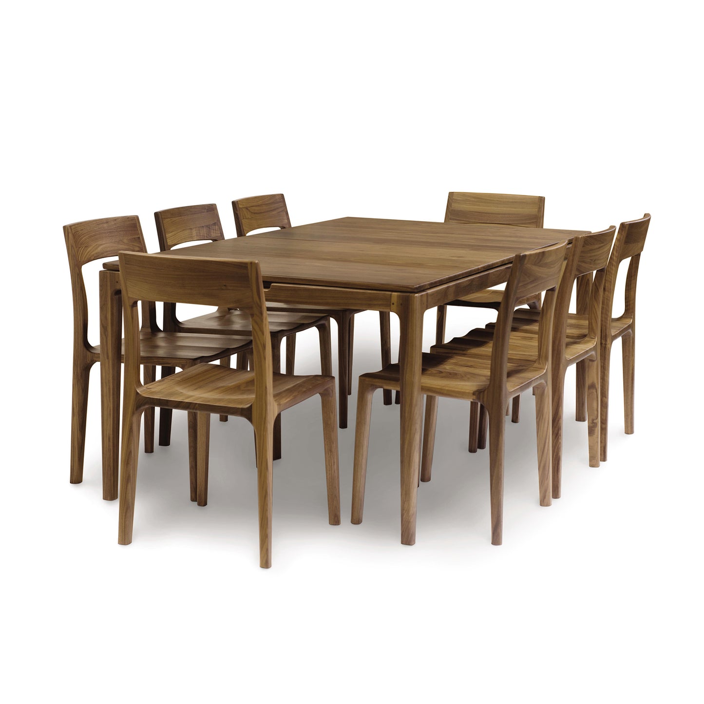 A Copeland Furniture Lisse Extension Dining Table set with eight matching chairs on a plain background.