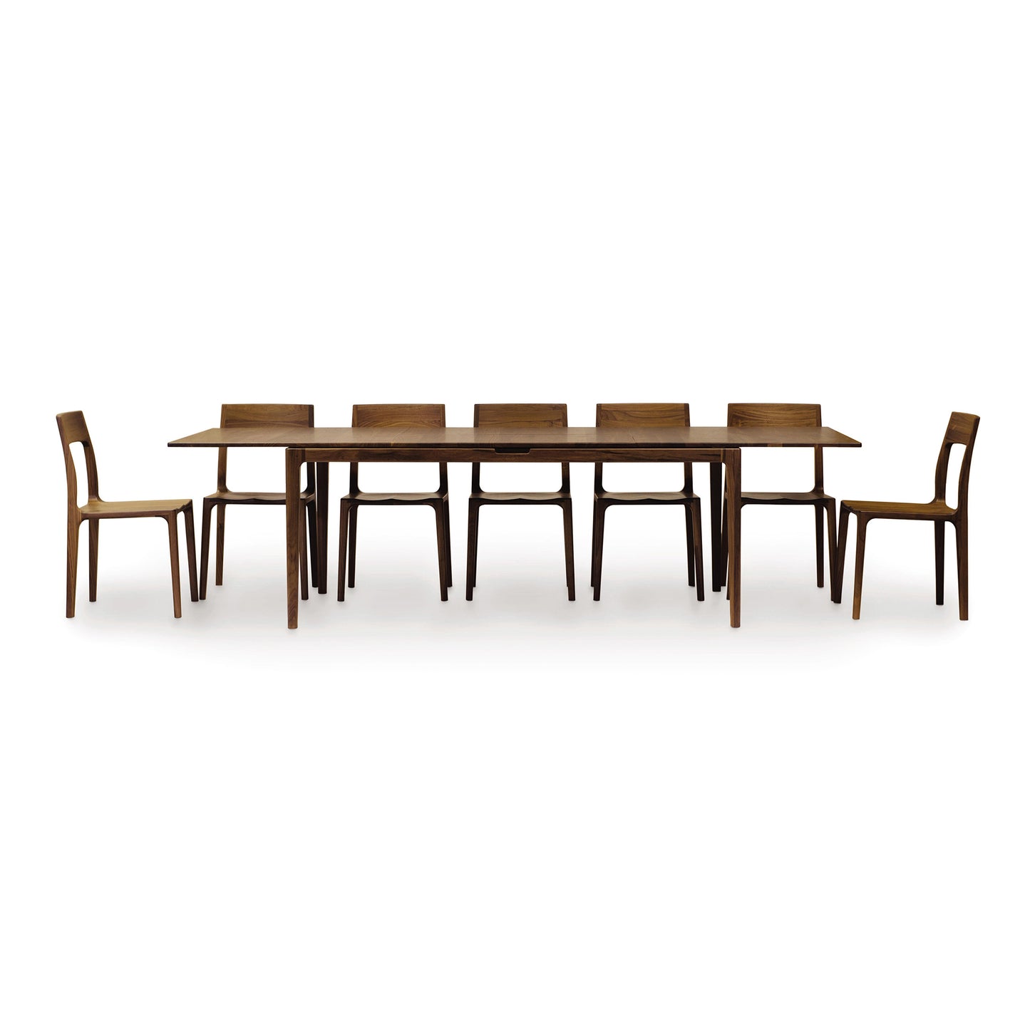 A Copeland Furniture Lisse Extension Dining Table set with six chairs arranged neatly around it, isolated on a white background.