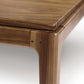 Corner of a Copeland Furniture Lisse Extension Dining Table showcasing the joinery and wood grain detail.