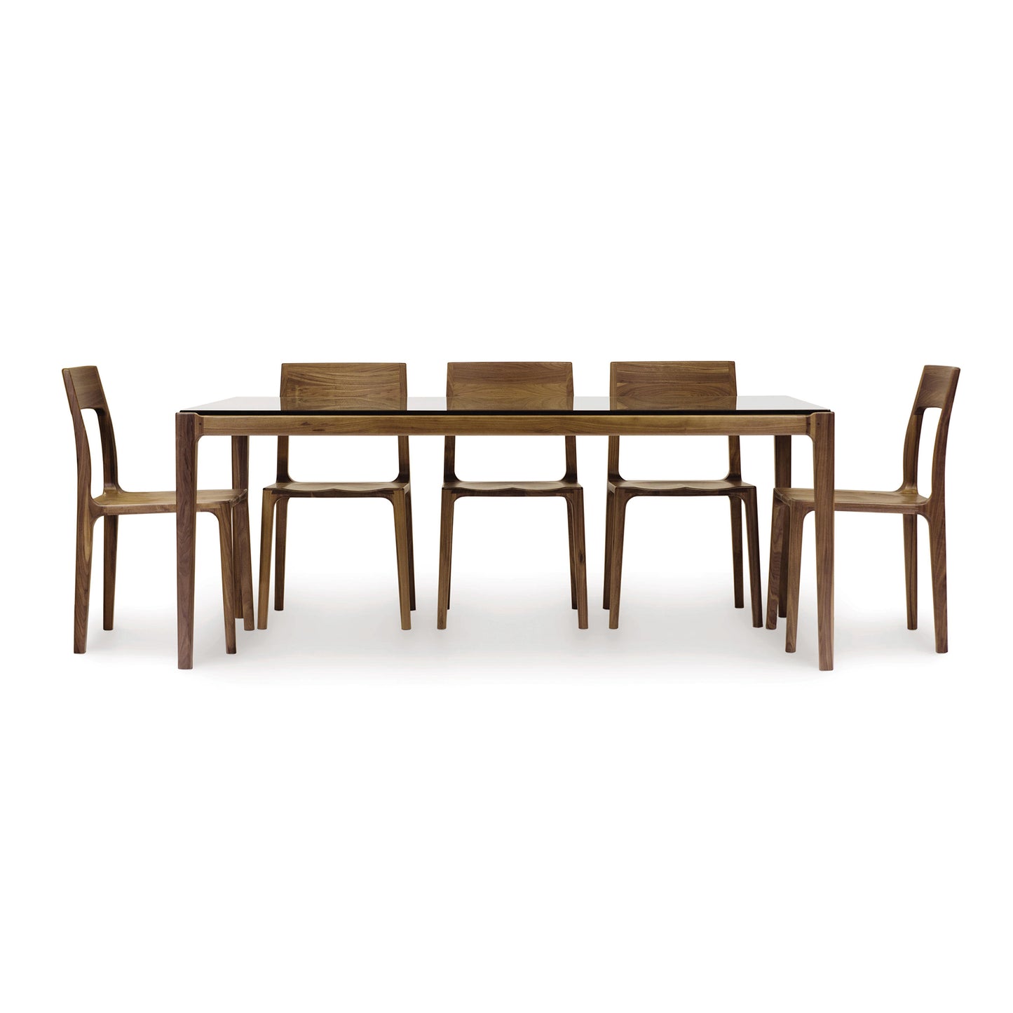 A minimalist design Lisse Glass Top Dining Table with six chairs and a glass top, crafted with natural walnut, made by Copeland Furniture.
