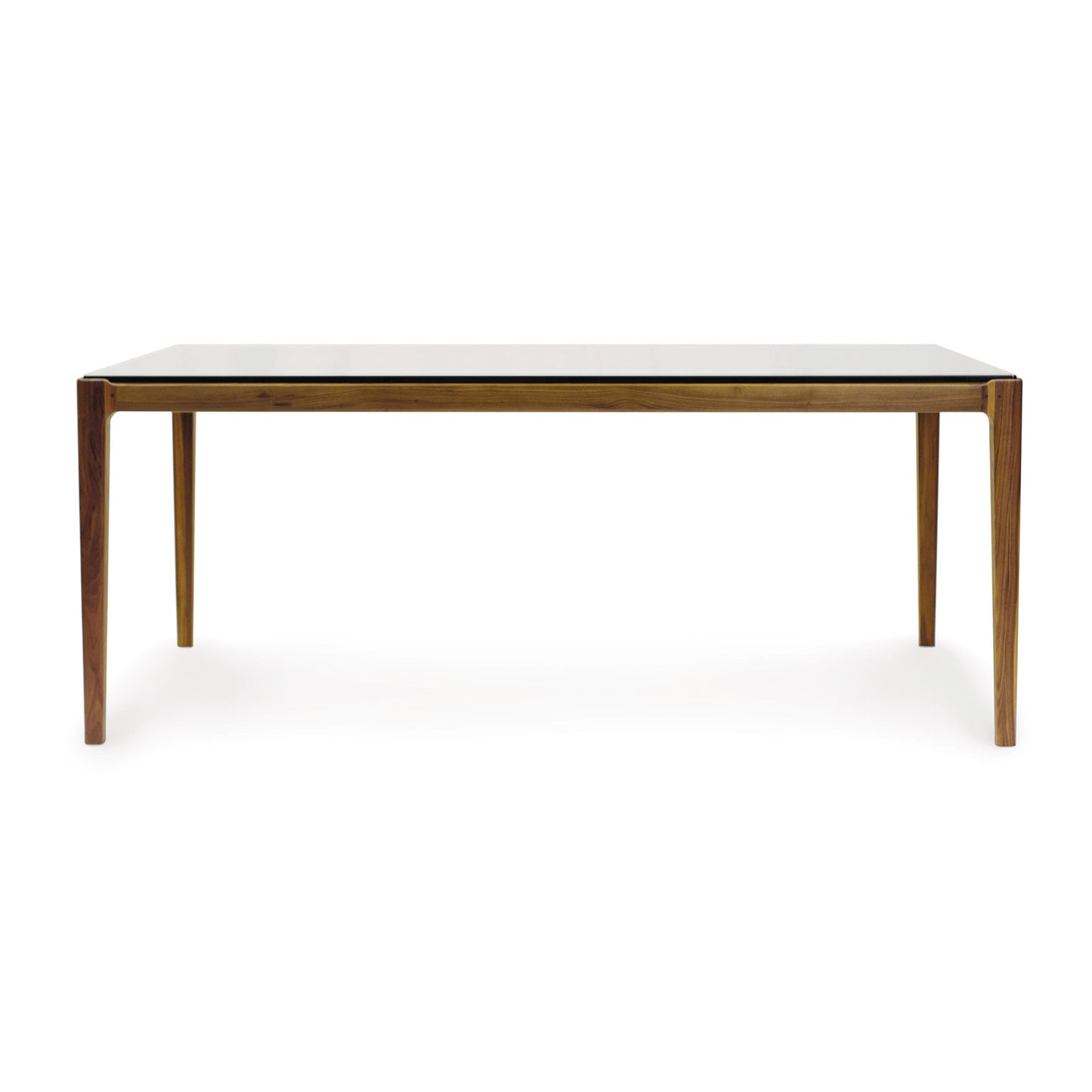 A minimalist design Lisse Glass Top Dining Table with a rectangular top, isolated on a white background from Copeland Furniture.