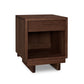 A modern wooden Loft 1-Drawer Enclosed Shelf Nightstand by Vermont Furniture Designs, perfect as a bedside table.