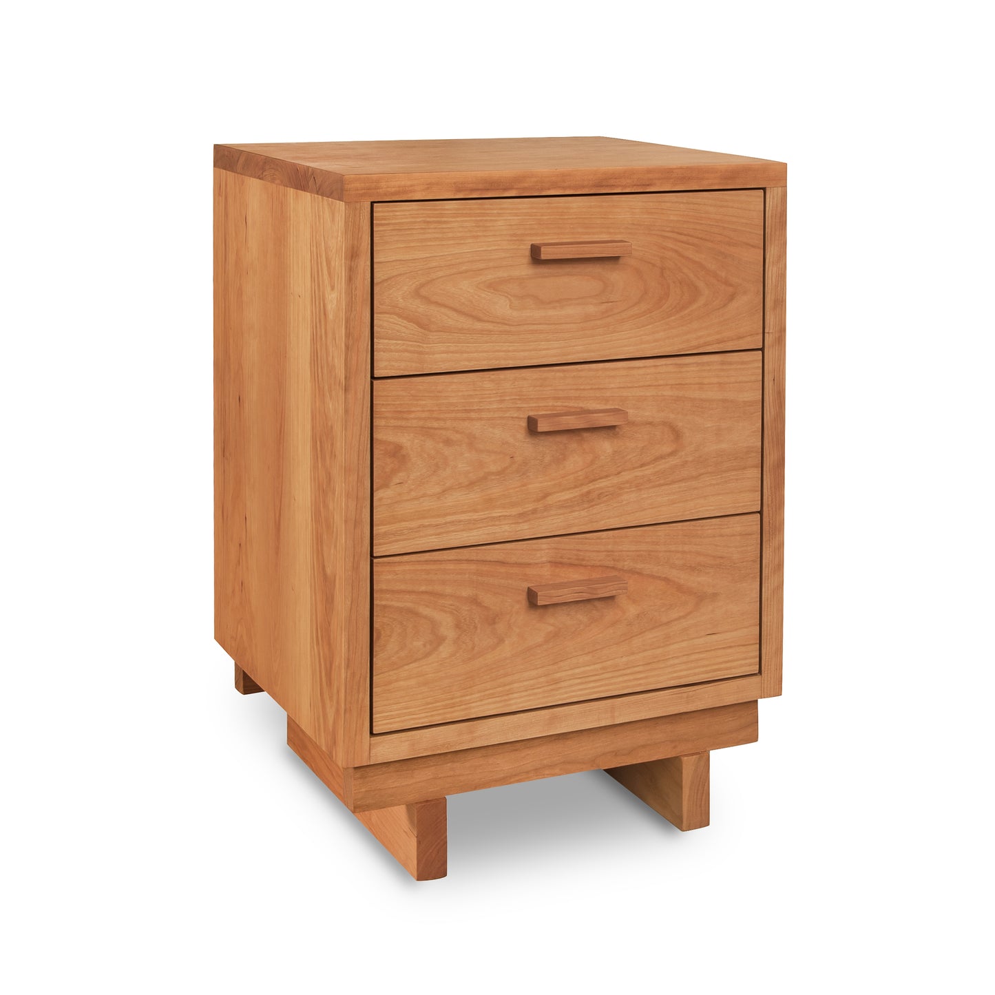 A Vermont Furniture Designs Loft 3-Drawer Nightstand with solid wood construction isolated on a white background.