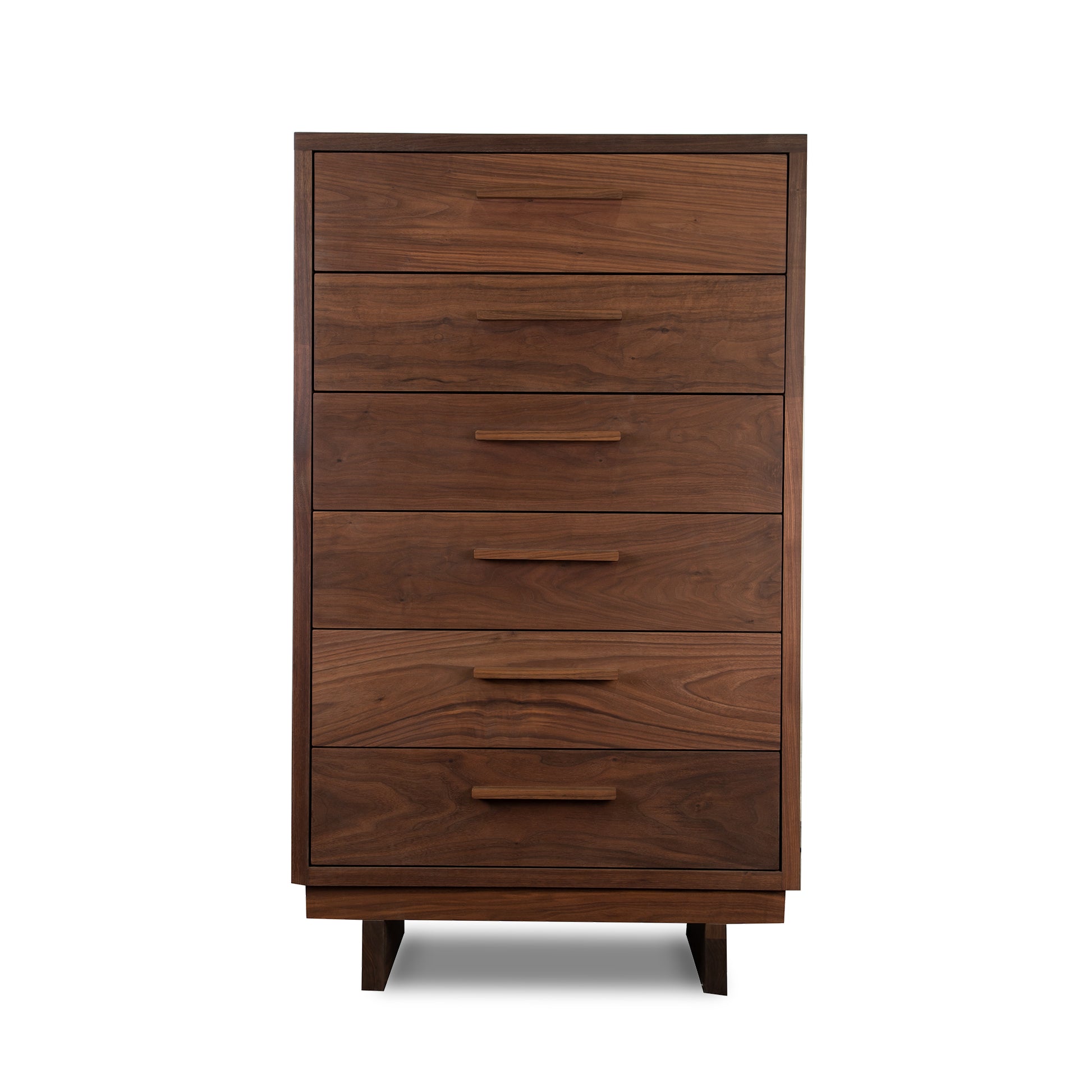A modern chest of drawers with a walnut finish.