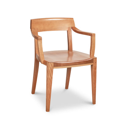 The Ludlow Chair by Vermont Woods Studios showcases elegant armrests, a curved backrest, and four straight legs, crafted from high-quality American wood.