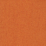 An image showing a close-up view of an orange textured surface. The surface appears uniform, with a slightly rough and grainy texture. There are no distinct patterns or designs visible.