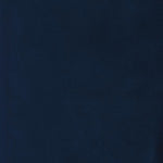 A solid dark blue background with a slightly textured appearance.