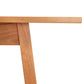Manchester Cherry Compact Desk by Vermont Woods Studios features solid cherry wood and angled legs, highlighting expert American craftsmanship.