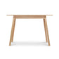 Manchester Compact Desk by Vermont Woods Studios, crafted from birch with four angled legs, front view highlighting fine American woodworking.