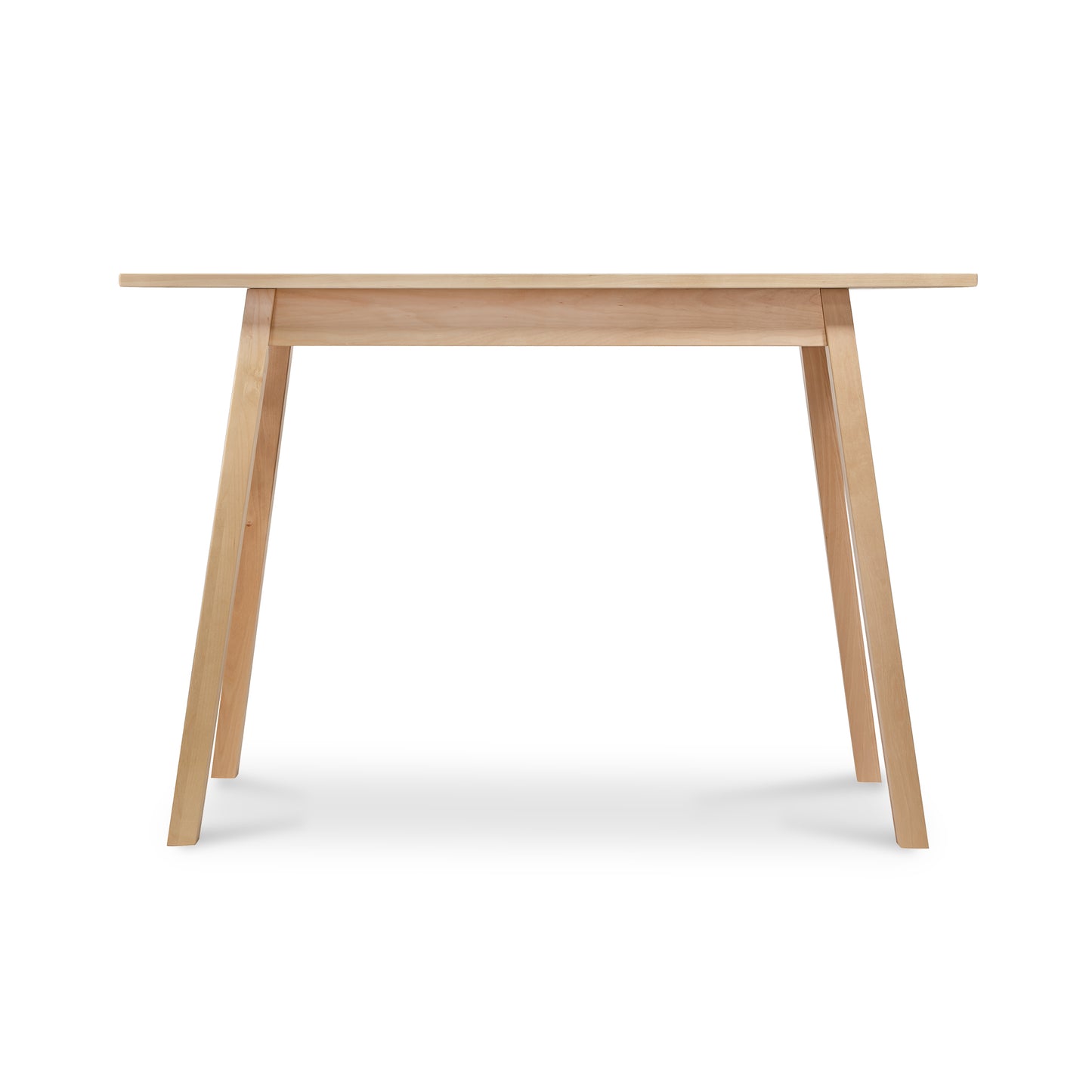 Manchester Compact Desk by Vermont Woods Studios, crafted from birch with four angled legs, front view highlighting fine American woodworking.