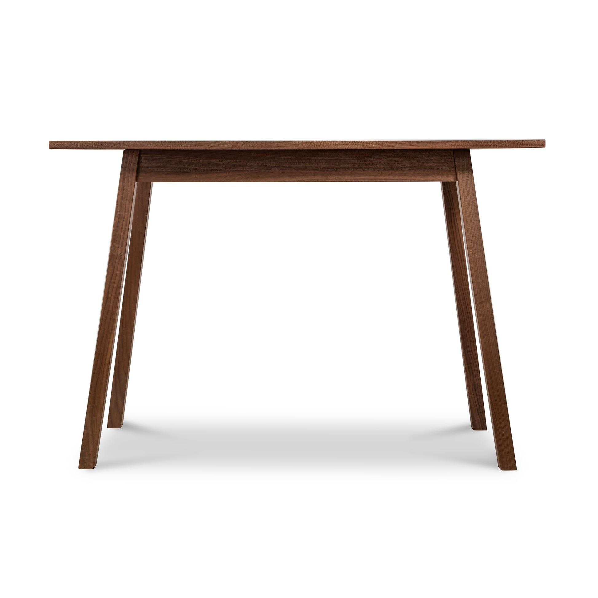 A dining table with a wooden top and legs.