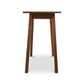 A wooden table with two legs on a white background.