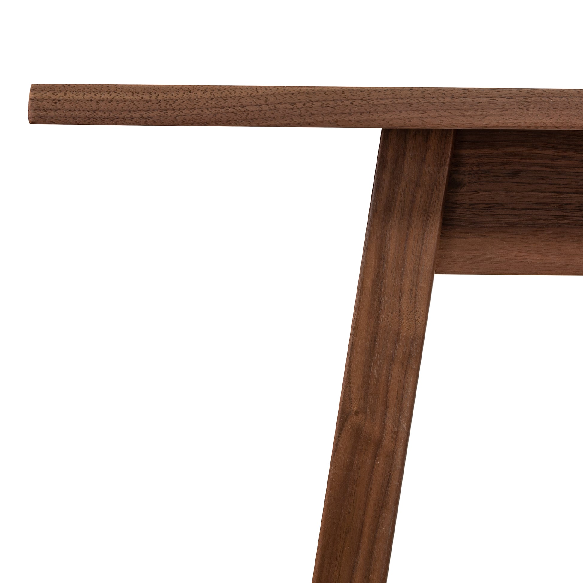 A close up image of a walnut dining table.