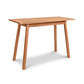 Manchester Cherry Compact Desk by Vermont Woods Studios, crafted in solid cherry wood with angled legs, showcasing modern American craftsmanship.