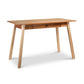 Manchester Two-Tone Writing Desk - Cherry and Birch by Vermont Woods Studios. Sustainable solid wood desk with a simple design, central storage drawer, light natural finish, and tapered legs. Ideal for modern home office furniture needs including American made furniture, cherry wood furniture, birch wood furniture.