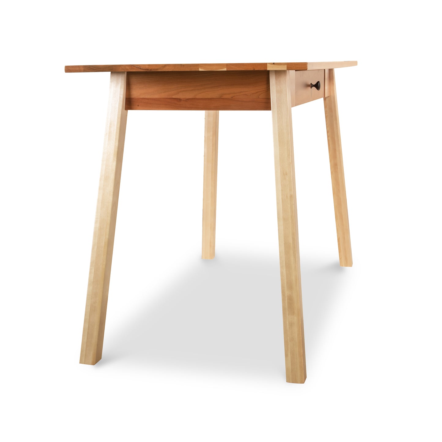 A wooden table with two legs and a drawer.