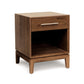 A Mansfield 1-Drawer Enclosed Shelf Nightstand from Copeland Furniture with one drawer and an open shelf on a white background.