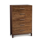 A solid natural wood Copeland Furniture Mansfield 5-Drawer Wide Chest with metal handles isolated on a white background.