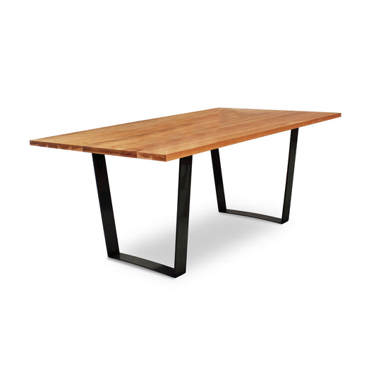 A Lyndon Furniture Metropolitan Solid Top Dining Table with a hardwood plank top and metal base, featuring black legs.