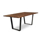 A Metropolitan Solid Top Dining Table from Lyndon Furniture with black legs.