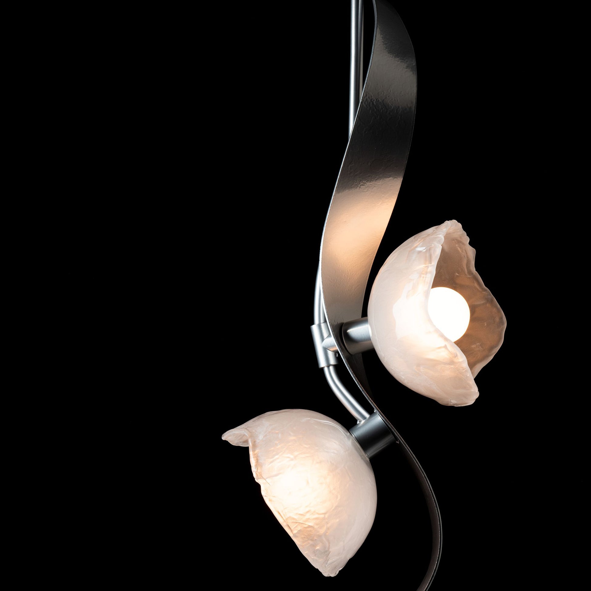 Hubbardton Forge Mika 2-Light Pendant featuring elegant curved metal arms with flower-shaped frosted glass shades.