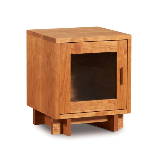 Modern American 1-Door Nightstand by Vermont Furniture Designs featuring solid wood construction, glass door, and geometric base.