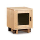 Modern American 1-Door Nightstand by Vermont Furniture Designs with a light wood cabinet, glass door, and dark base—expertly crafted in Vermont.