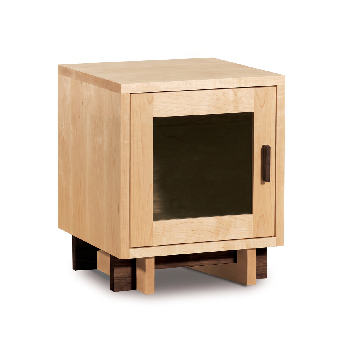 Modern American 1-Door Nightstand by Vermont Furniture Designs with a light wood cabinet, glass door, and dark base—expertly crafted in Vermont.
