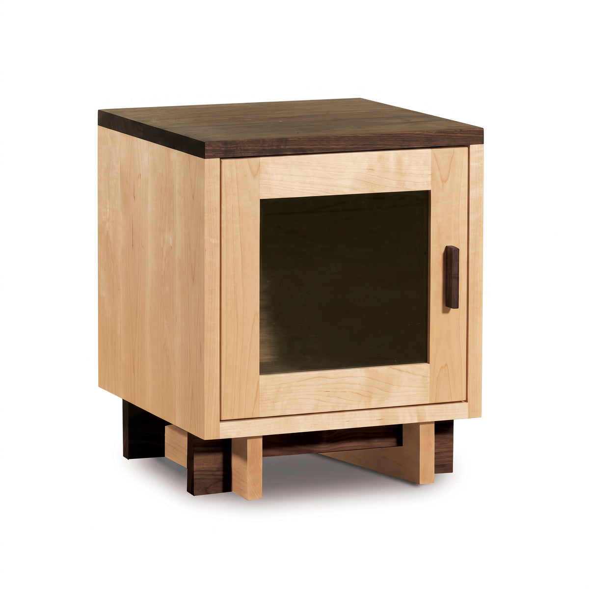 Modern American 1-door nightstand by Vermont Furniture Designs, featuring dark wood and a glass-front cabinet, handcrafted in Vermont.