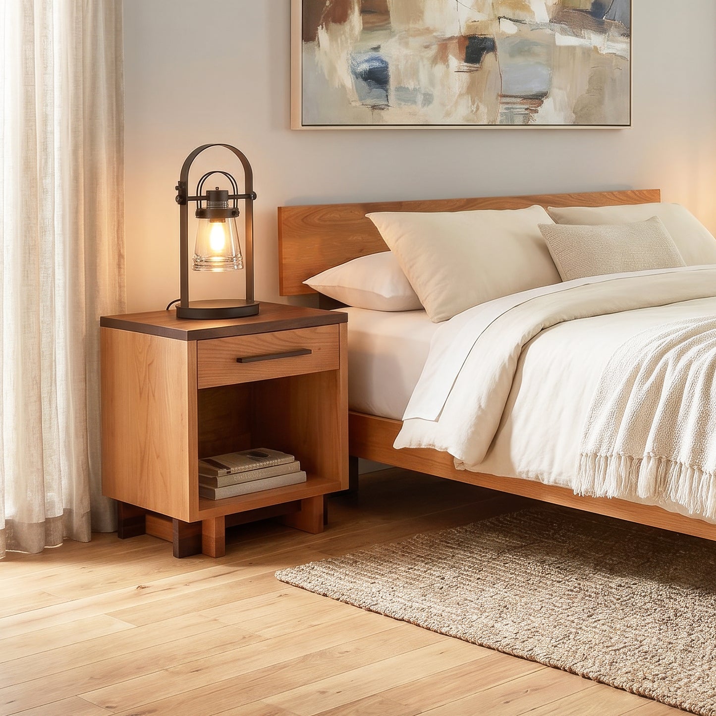 Vermont Furniture Designs Modern American Nightstand beside a bed, highlighting quality craftsmanship and elegant wooden construction.
